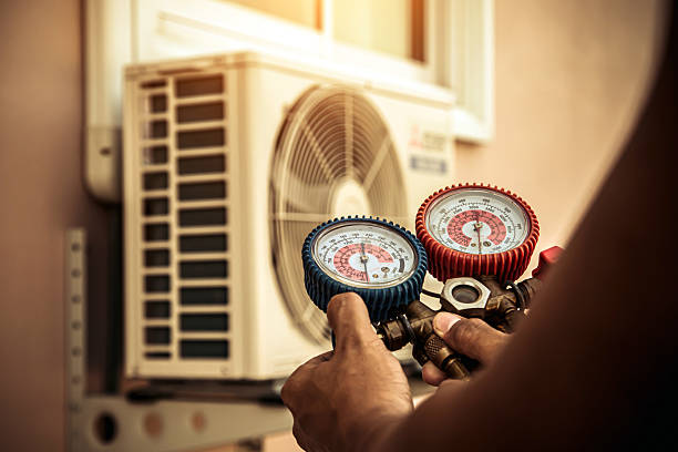 Professional Heat Pump Repair technician working in Ore City, TX